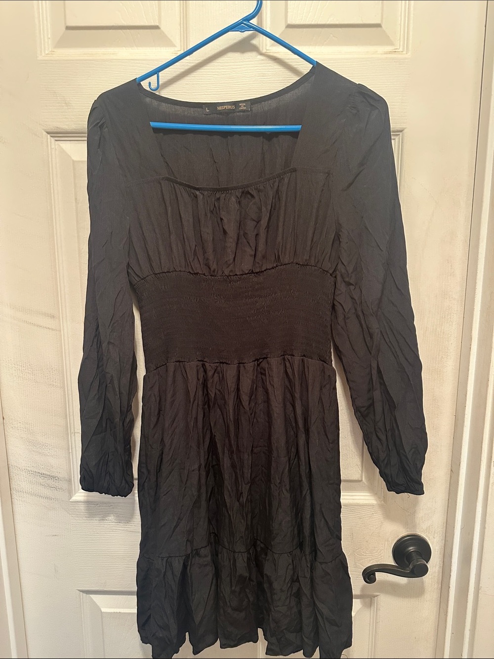 Black Smocked-Waist Midi Dress with Long Sleeves.